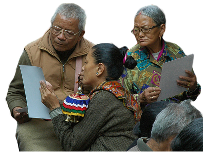Three people reading a flyer